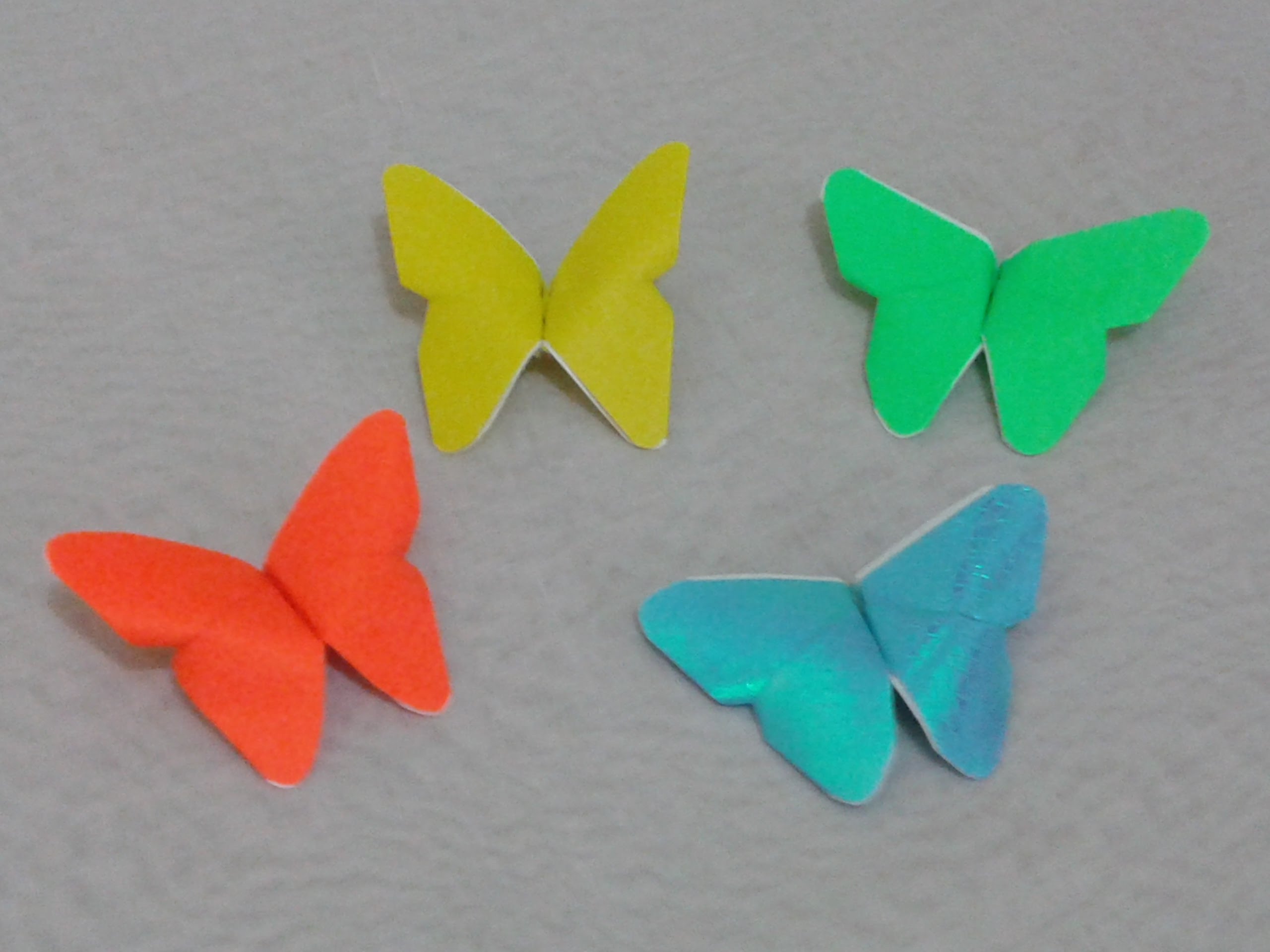 Folded paper origami butterflies