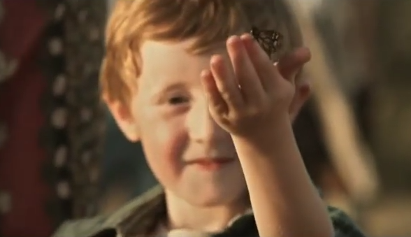 Butterfly circus short film boy holding butterfly